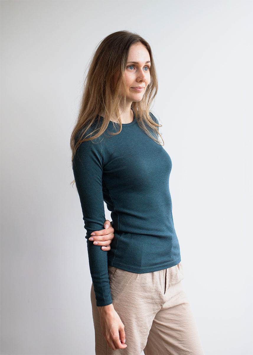 Modellen er 178 cm høy og bruker størrelse 34/36